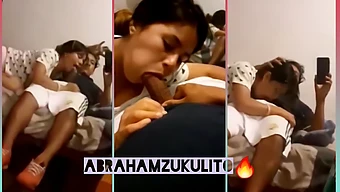 A Teenage Girl Performs Oral Sex On A Man In Front Of A Mirror In Her Dorm Room