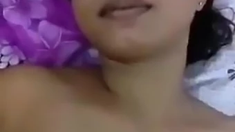 Indian Homemade Video Features An Attractive Young Woman From India.