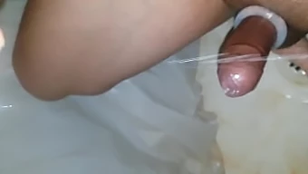 Asian teen's orgasmic experience with her favorite sex toy in the shower