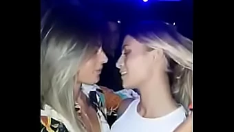 Voyeuristic footage of a stunning young blonde engaging in lesbian acts